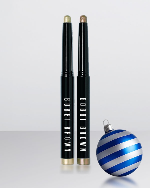 Model with foundation and foundation brush on face